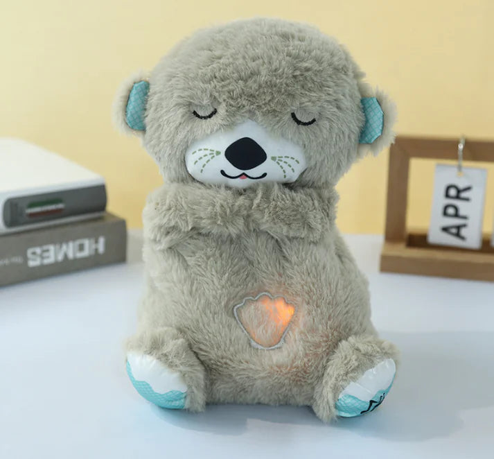 **"Osito de Peluche Baby con Respiración: Juguete Relaxante con Música y Luz para Dormir"**